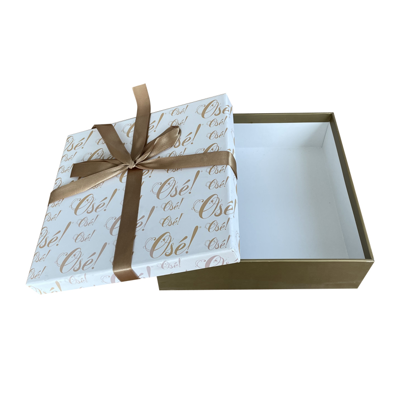 Cardboard paper clothes gift box with ribbon