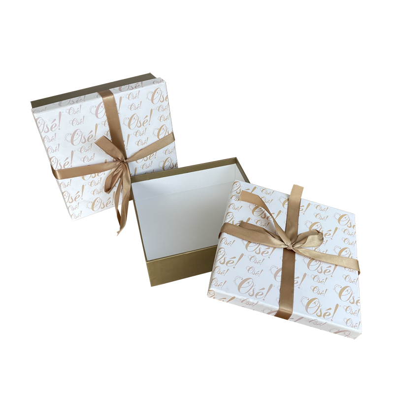 Cardboard paper clothes gift box with ribbon