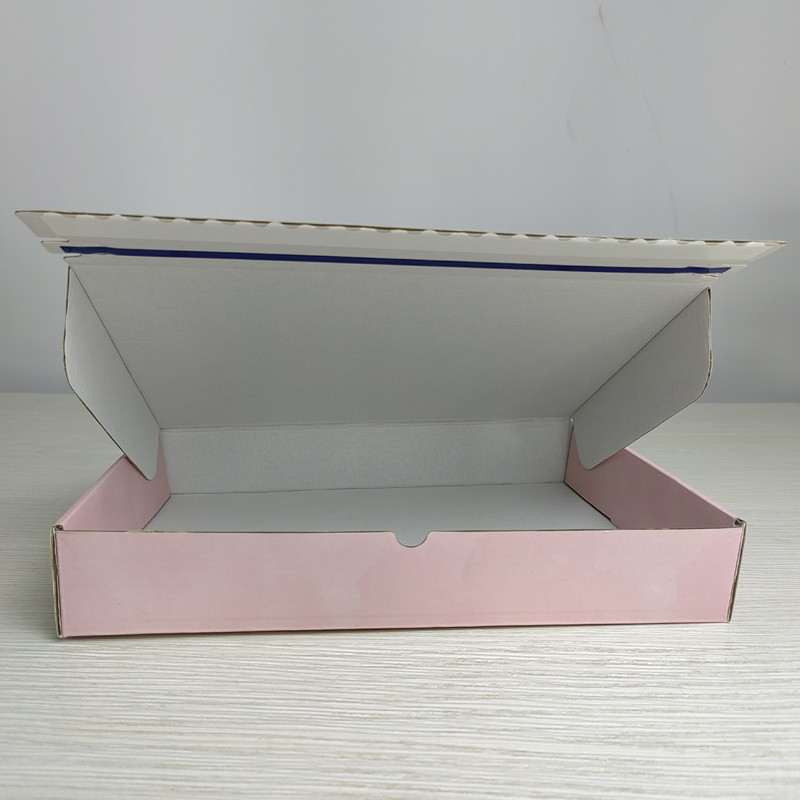 Zipper tear corrugated shipping box